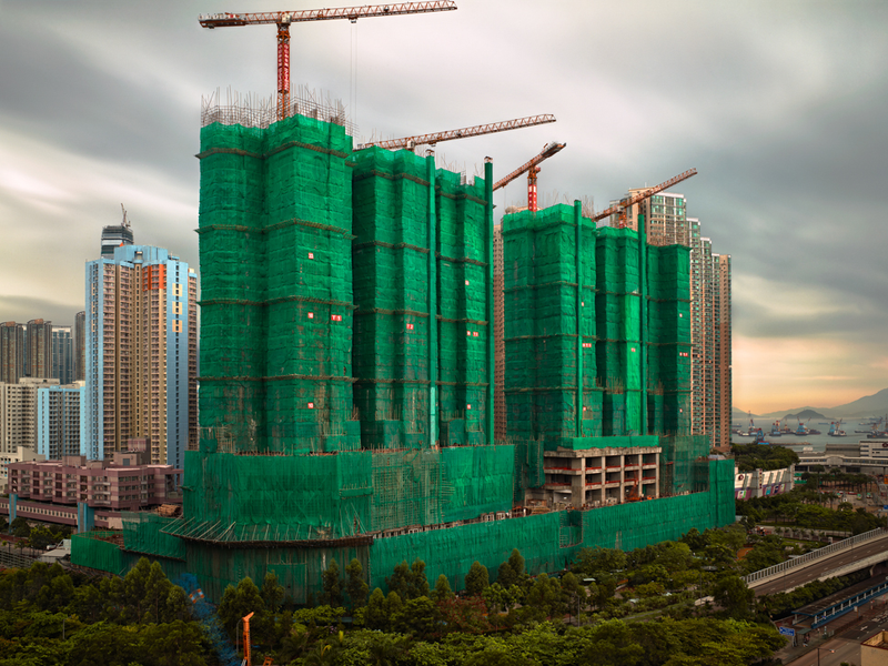 Illustration for article titled The Surreal Sight of Skyscrapers Encased in Colored Fabric